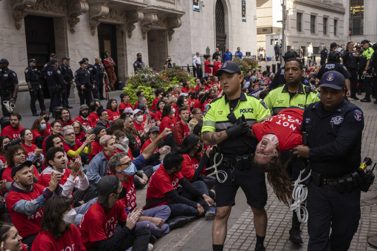  Protesters stage sit-in outside New York Stock Exchange to spotlight Gaza attacks