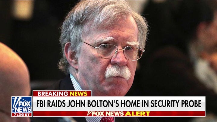 John Bolton blasted by Trump ally Roger Stone, who faced Biden FBI raid: ‘Karma is a b—-‘