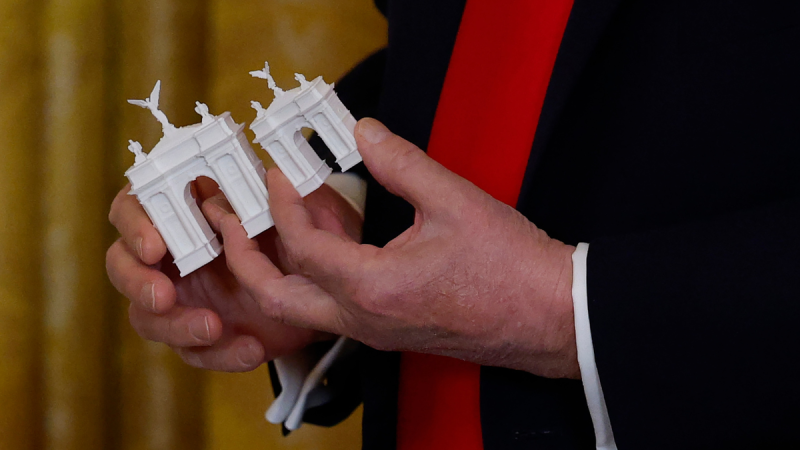 Trump reveals Arc de Triomphe-style monument for America’s 250th anniversary