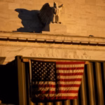 Stocks and bonds rally after Fed hikes rates and oil prices fall