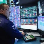 S&P 500 closes at record high as Nvidia nears $6 trillion milestone